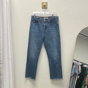 LEVIS wedgie straight button fly jeans. raw hem. sz 28